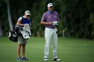 Nicki Stricker carrying bag of her husband Steve at the 2016 Sony Open In Hawaii (via Getty Images)